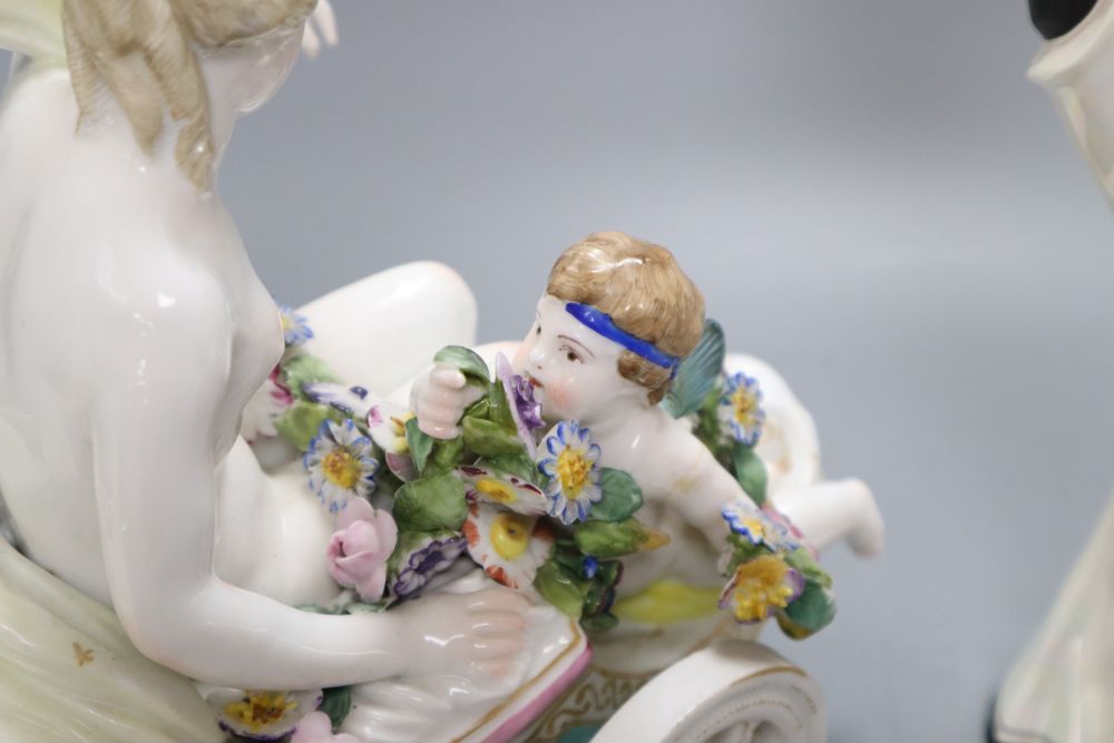 A Thuringian group of Venus and Cupid (some damage) and a Michael Sutty limited edition figure of an Art Deco style lady, tallest 33cm
